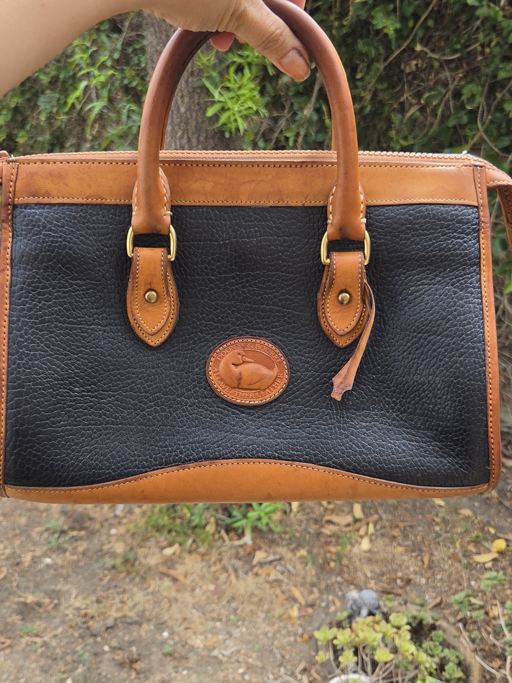Dooney & Bourke Black and Tan Leather Satchel